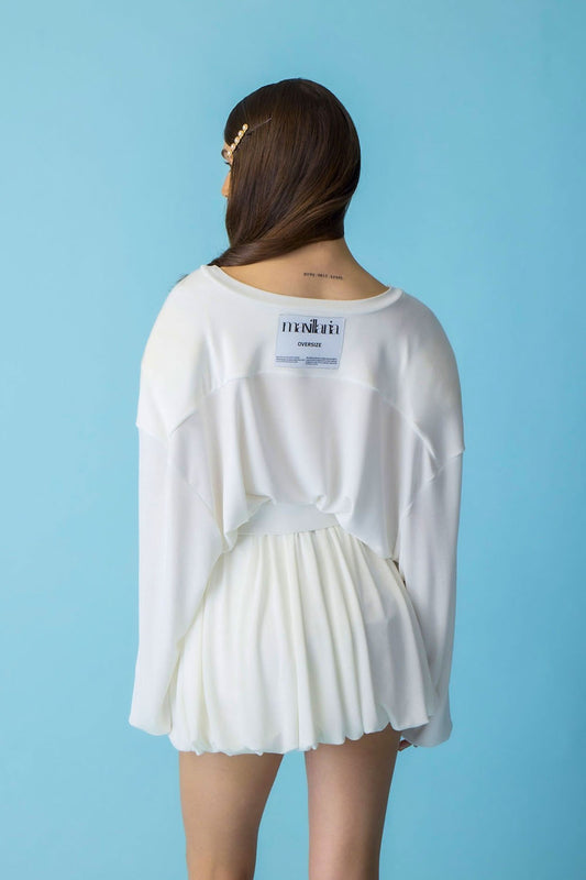Oversized white tennis-style skirt